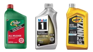 A collection of different brands of motor oil in branded containers